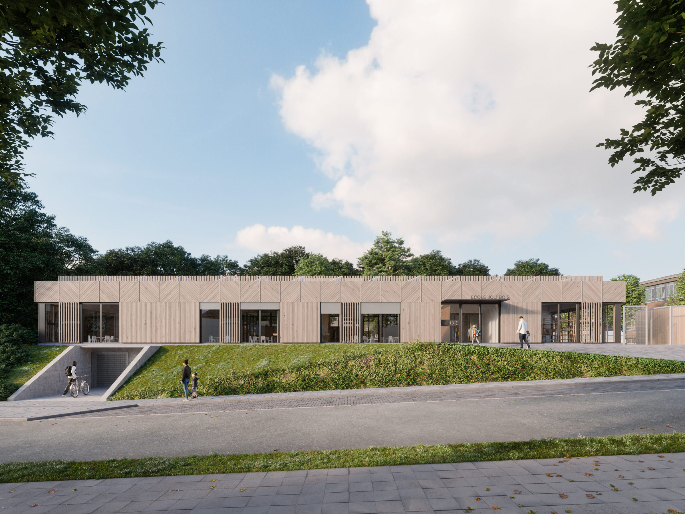La nouvelle école maternelle francophone de Joli-Bois se développe sur un seul niveau. La façade a un revêtement en bardage bois vertical et oblique.